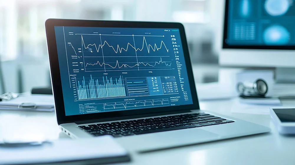 Someone pointing a pen on a paper showing graphs