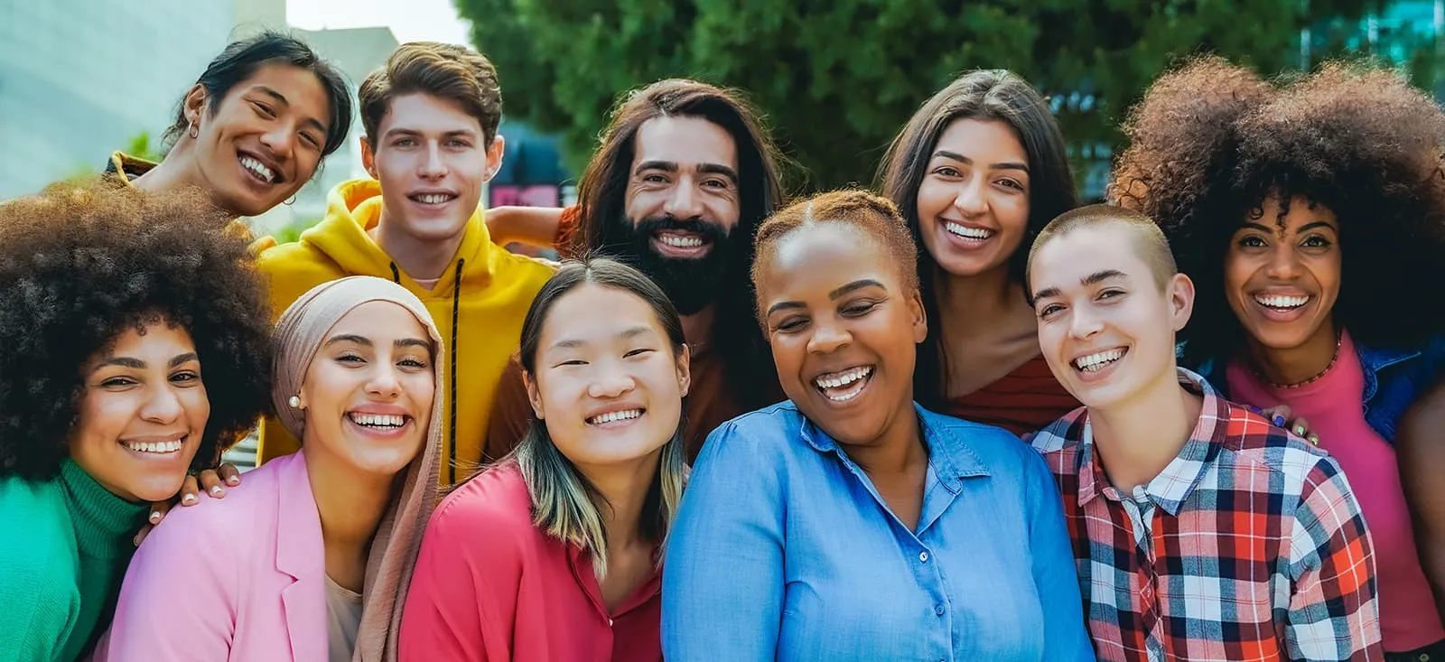 Students smiling together outdoors.